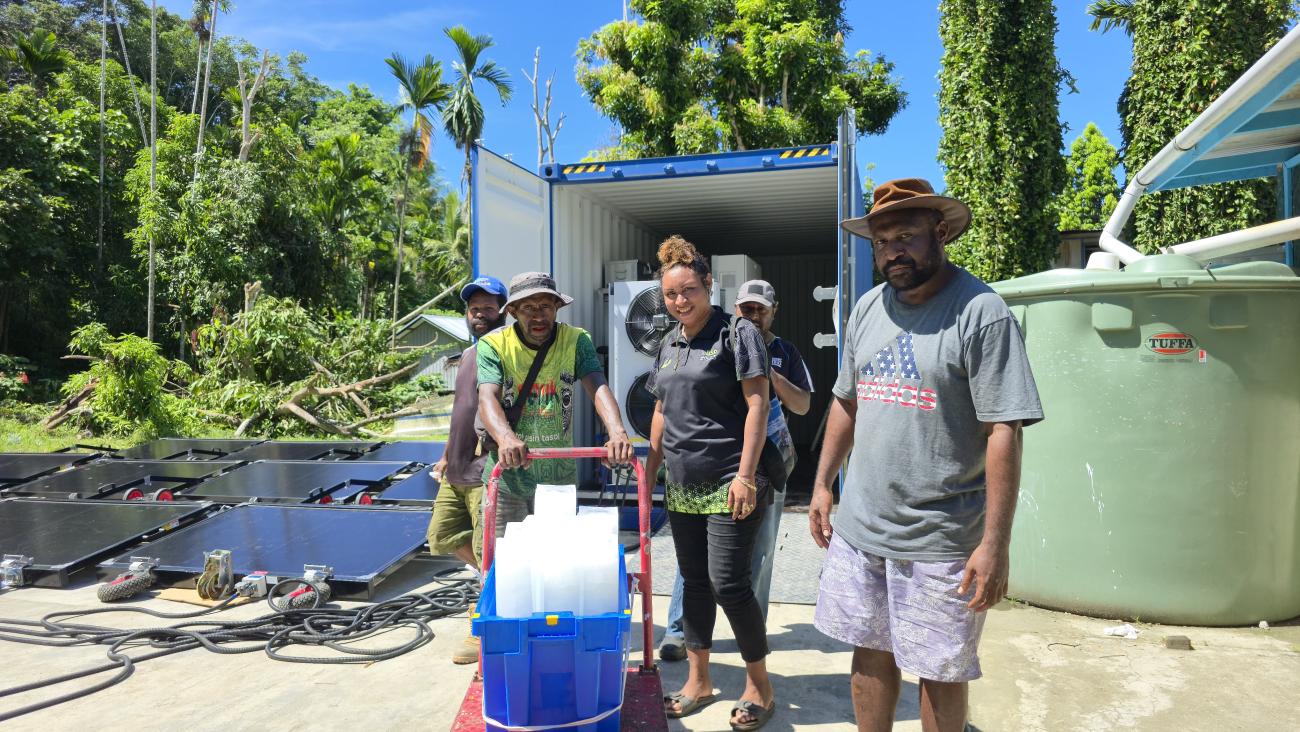 Community members harvesting ice blocks from Solarator