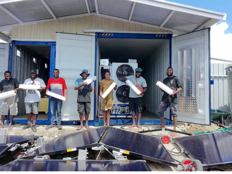 Community members harvesting ice blocks from Solarator